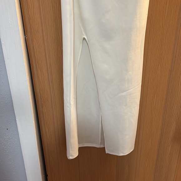 Long eggshell colored dress w/slit on side and front bottom just to big - Picture 2 of 4